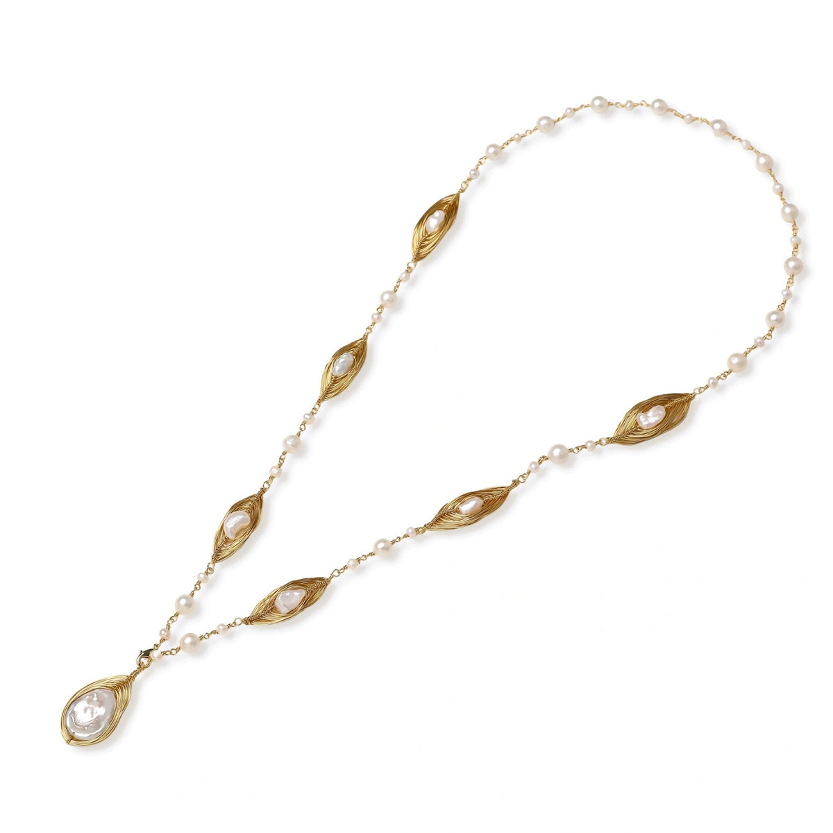 14K gold plated necklace with organic leaf motifs and freshwater pearls arranged in an elegant chain design on neutral background.