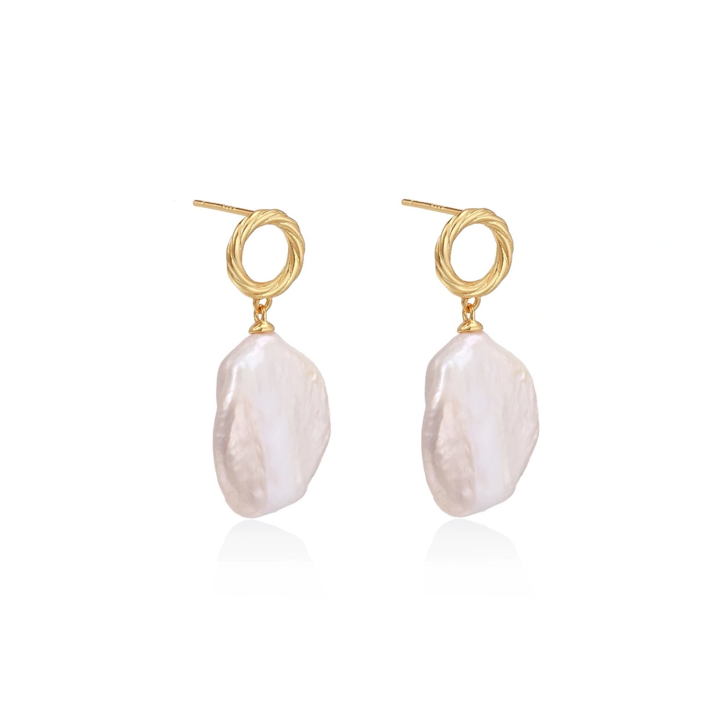 18K gold vermeil twisted circle studs with organic white baroque pearl drops on cream background