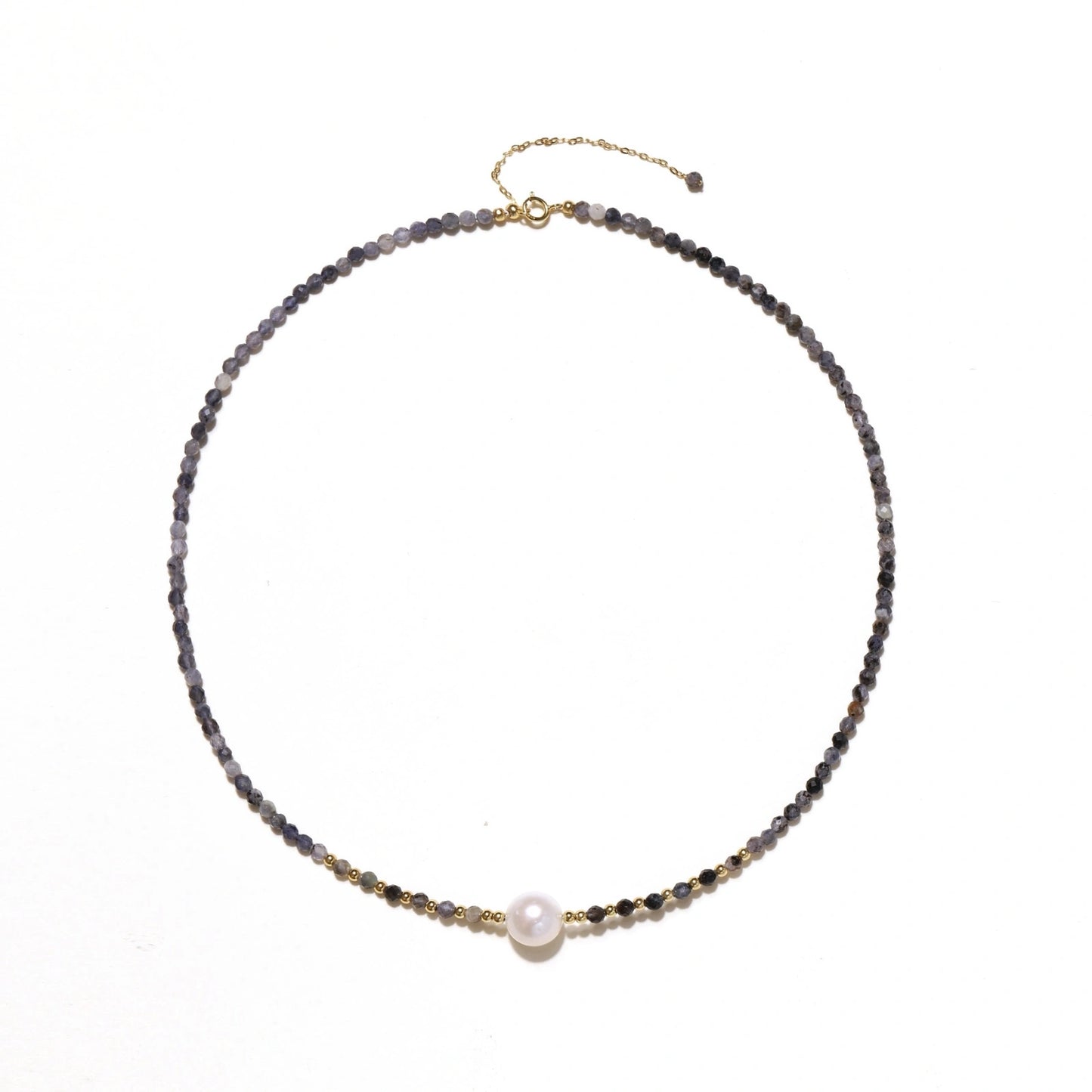 Dainty necklace with faceted purple iolite beads, gold vermeil accents, and central pink-white freshwater pearl.