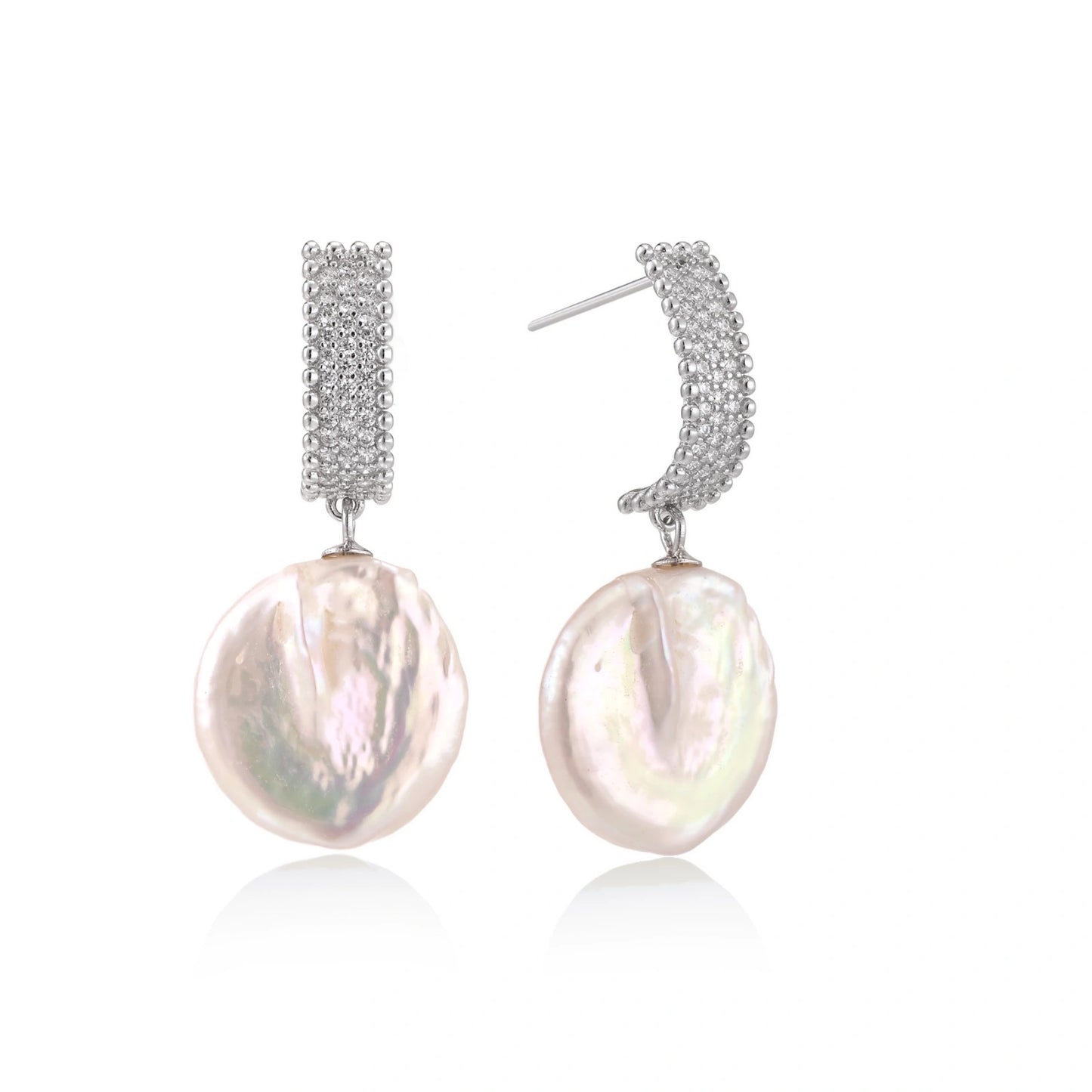 Rhodium-plated silver curved stud with pave stones and baroque pearl drop on white background