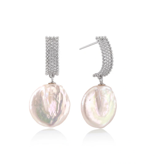 Rhodium-plated silver curved stud with pave stones and baroque pearl drop on white background