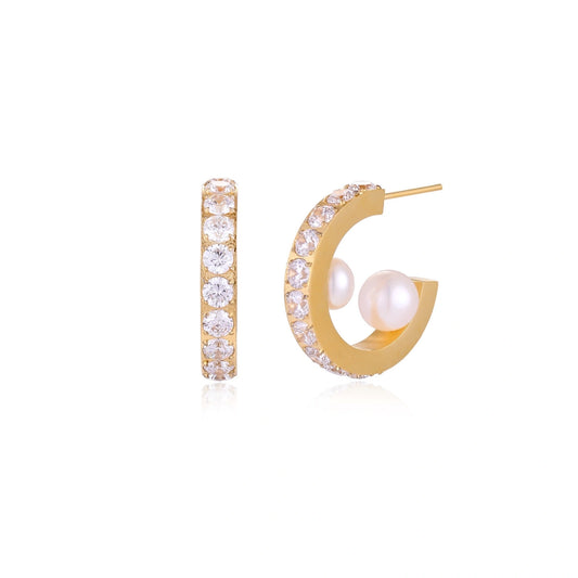 Gold pavé hoop earrings with two freshwater pearls nestled inside the curved design, featuring crystal-studded outer edge.