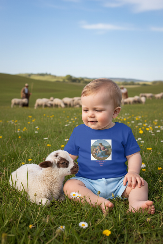 Baby wearing Alba Madonna t-shirt with baby lamb lying next to them