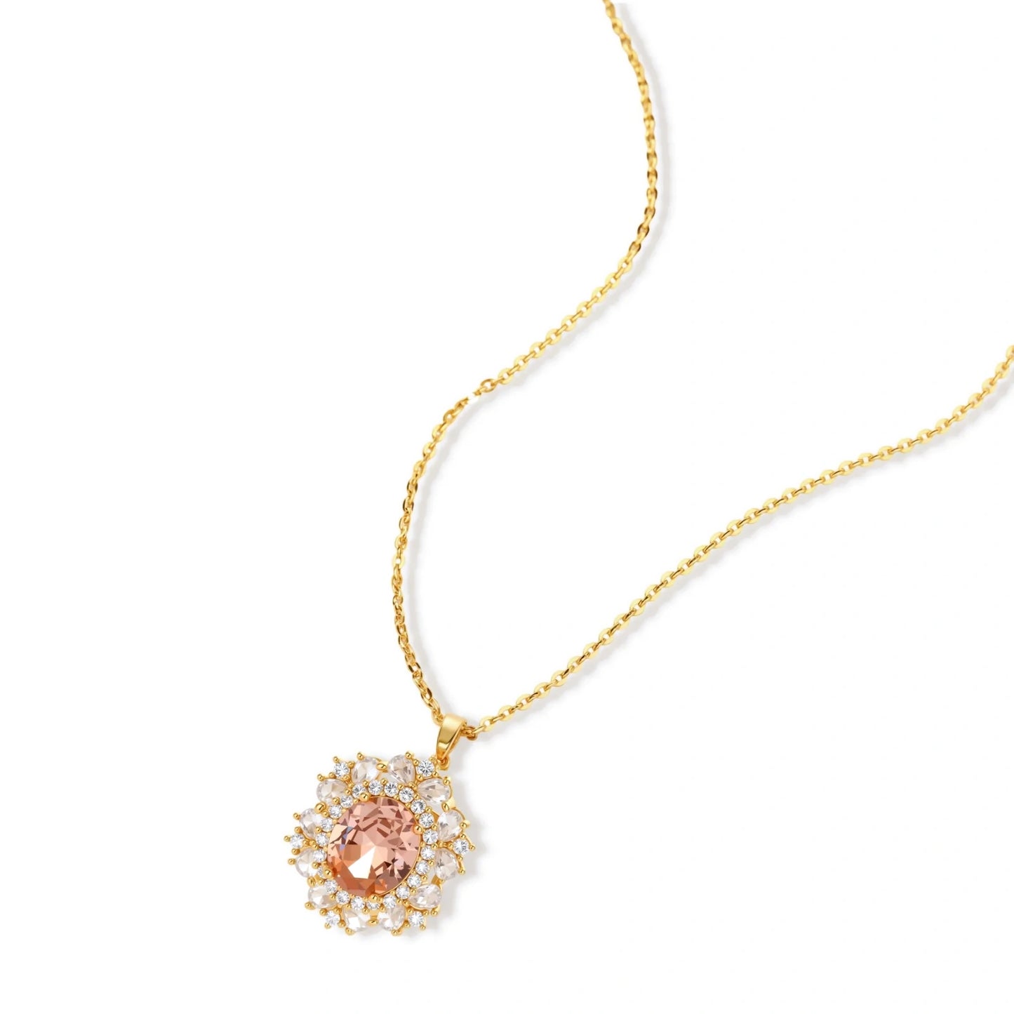 Ornate gold-plated jewelry set featuring peach center stone surrounded by clear AAA cubic zirconia crystals